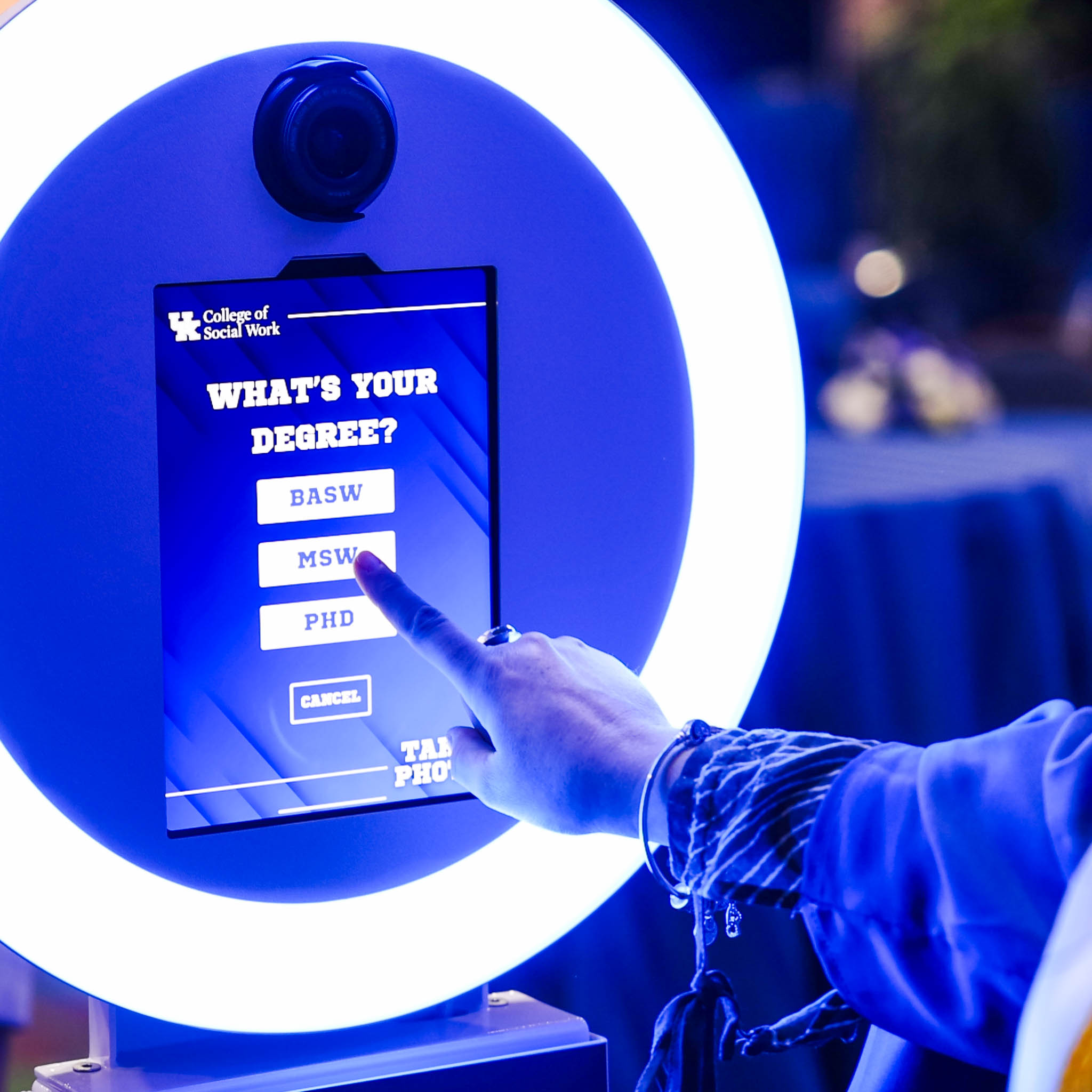 A guest selecting their degree to dynamically display on their custom trading card