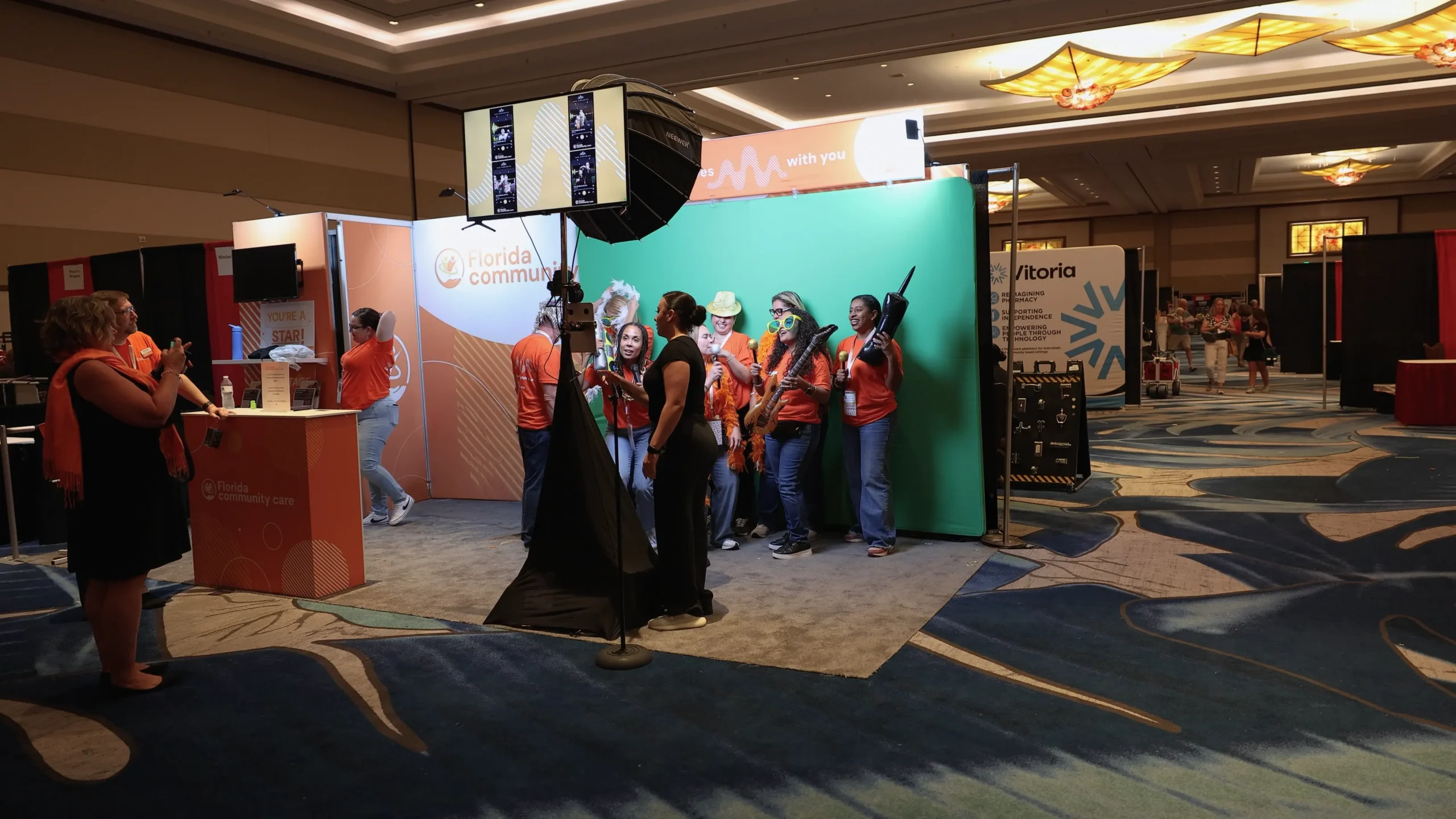 Crowd engagement at a green screen photo booth activation
